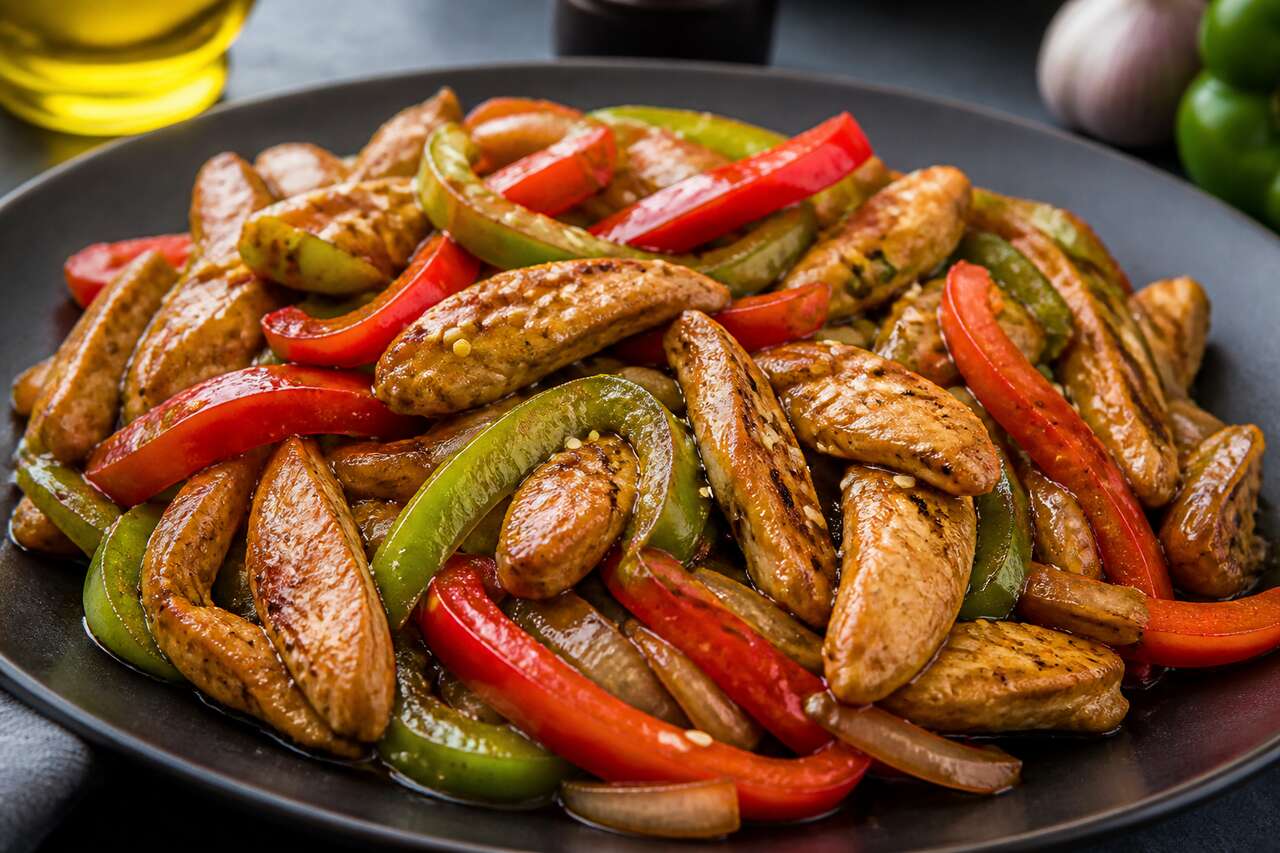 Poulet sauté aux poivrons : recette gourmande et facile